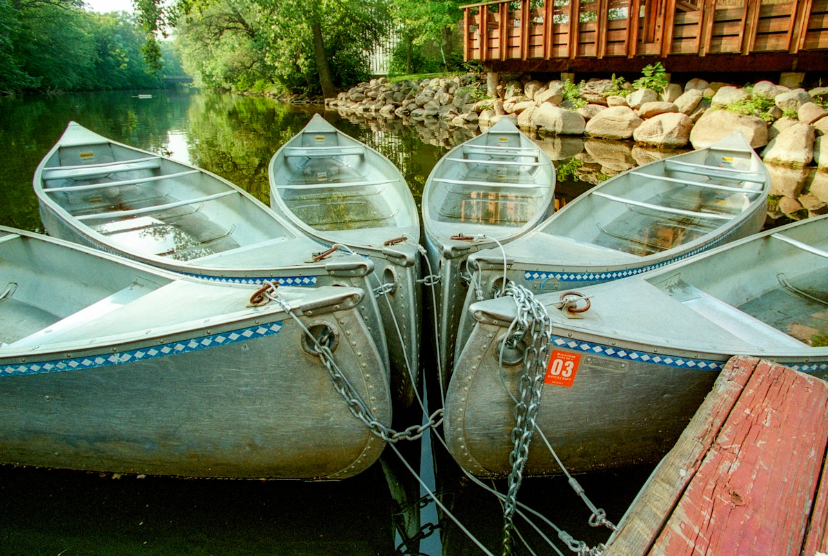 a couple of boats that are sitting in the water