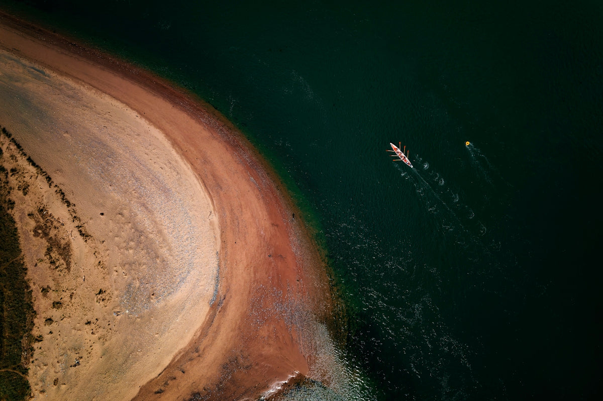 An aerial view of a boat in the water