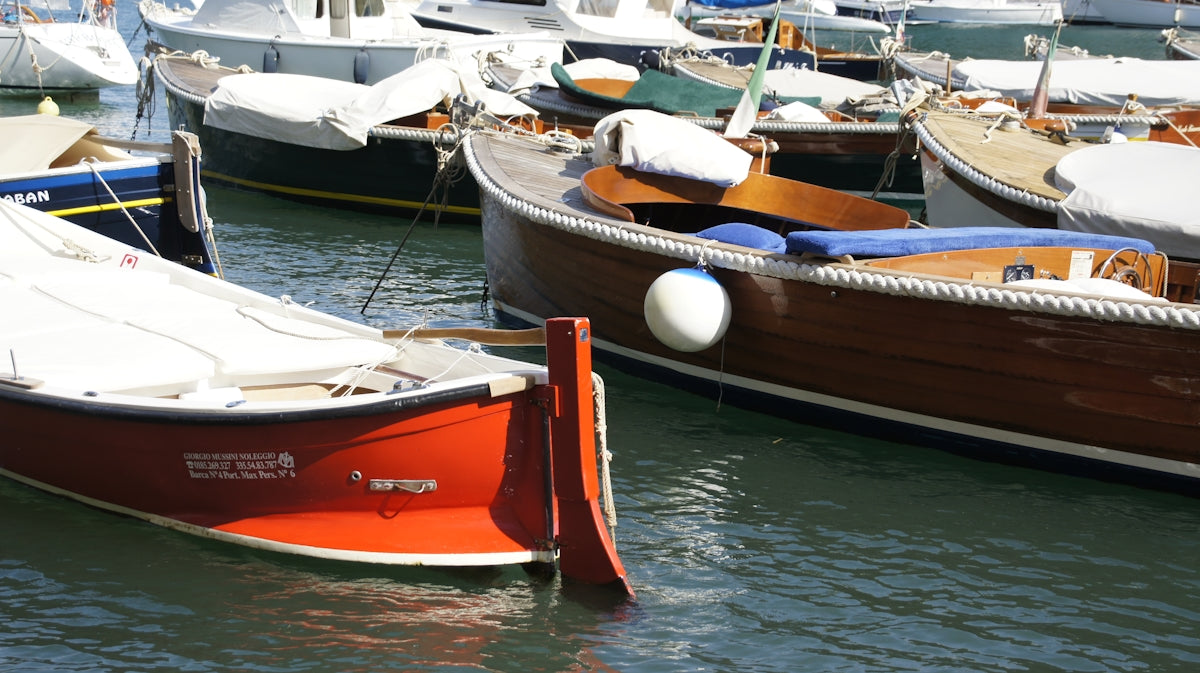 A bunch of boats that are in the water