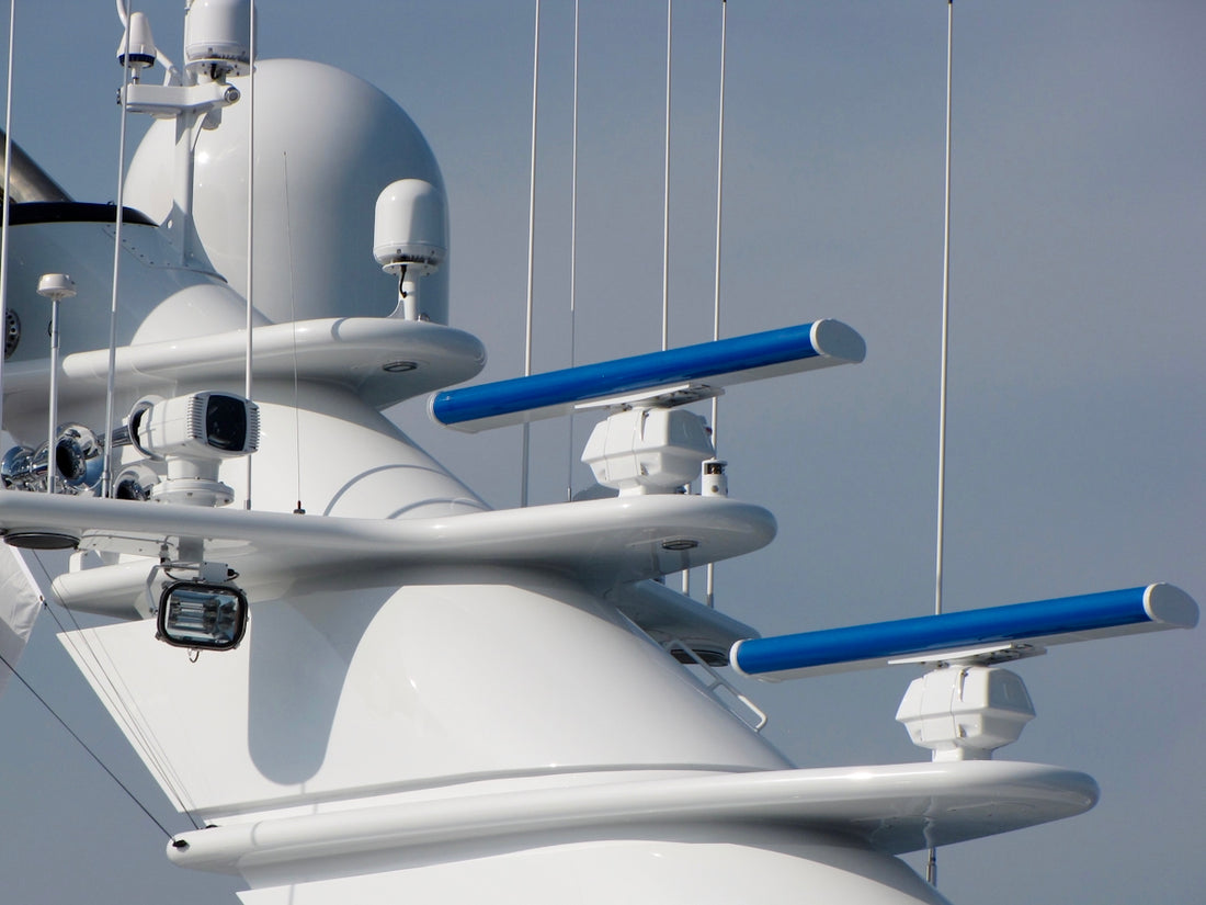 White ship with radar antennas and navigation equipment