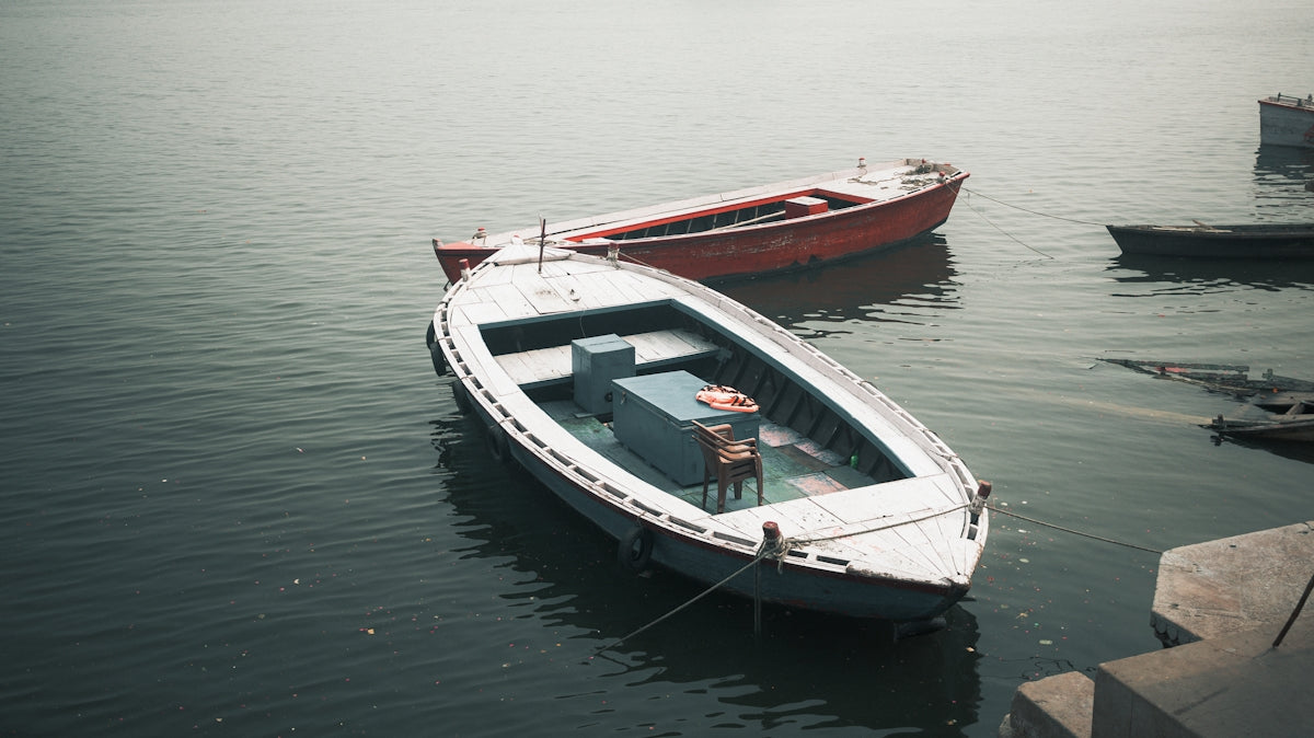 Two boats floating on the water