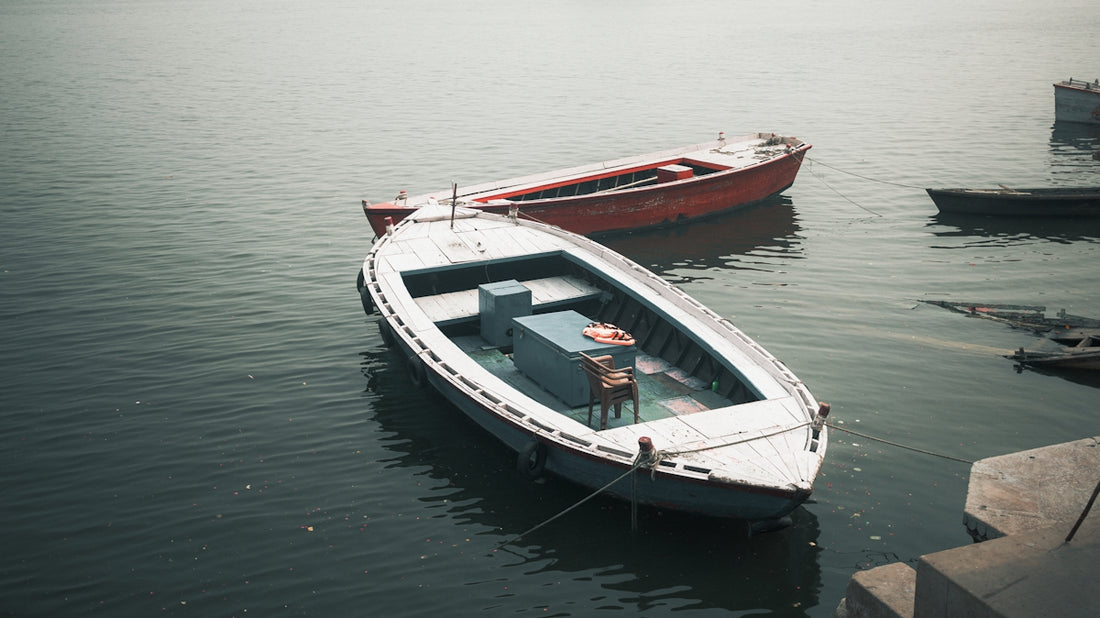 Two boats floating on the water